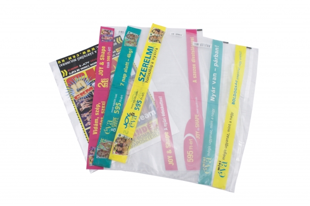 Plastic bag with adhesive strip